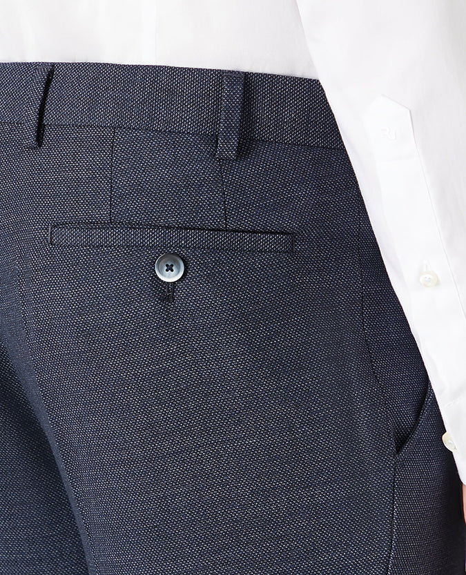 Man wearing a blue Tapered Leg Suit Trouser