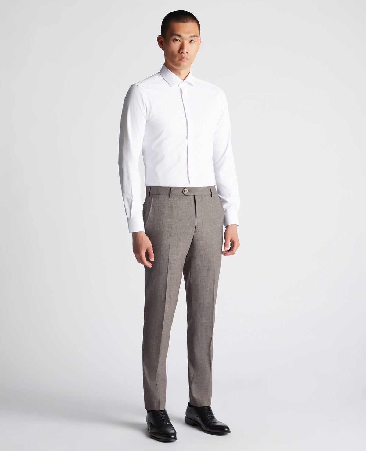 Man wearing a brown X-Slim Fit Wool Blend Mix And Match Suit Trouser
