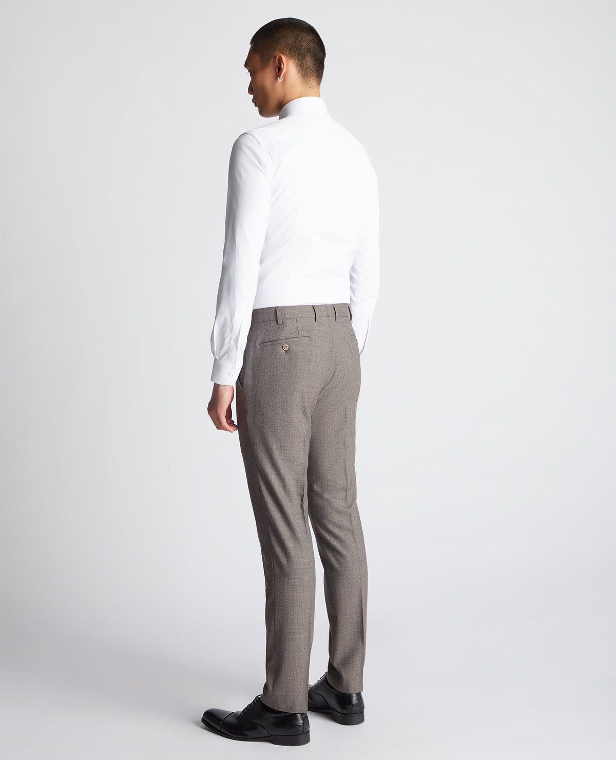 Man wearing a brown X-Slim Fit Wool Blend Mix And Match Suit Trouser