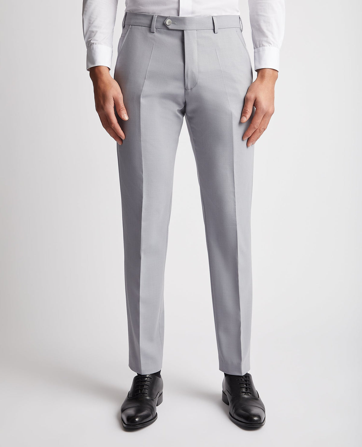 Man wearing a blue Slim Leg Wool Rich Mix and Match Suit Trouser