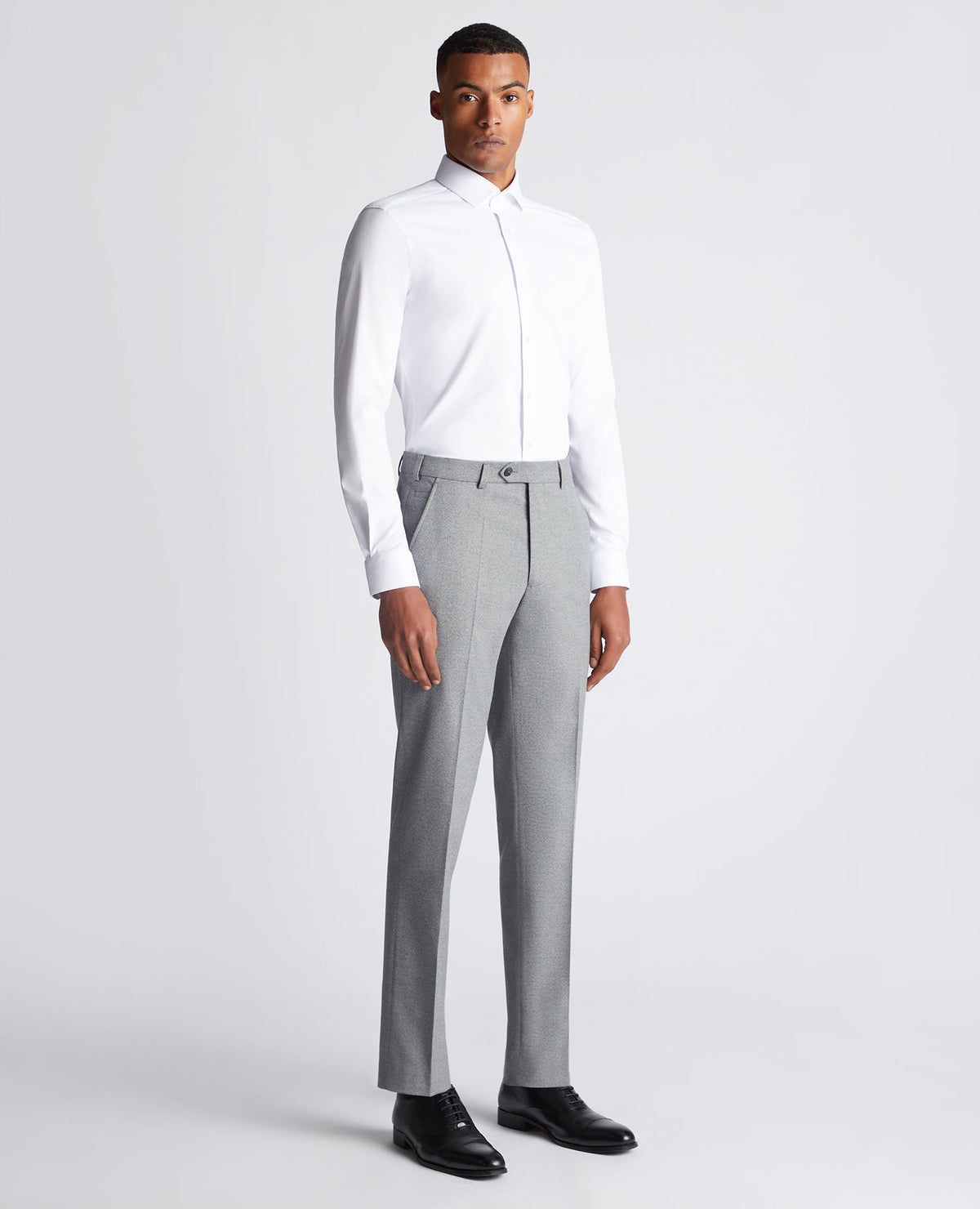 Man wearing a grey Slim Leg Stretch Formal Trousers