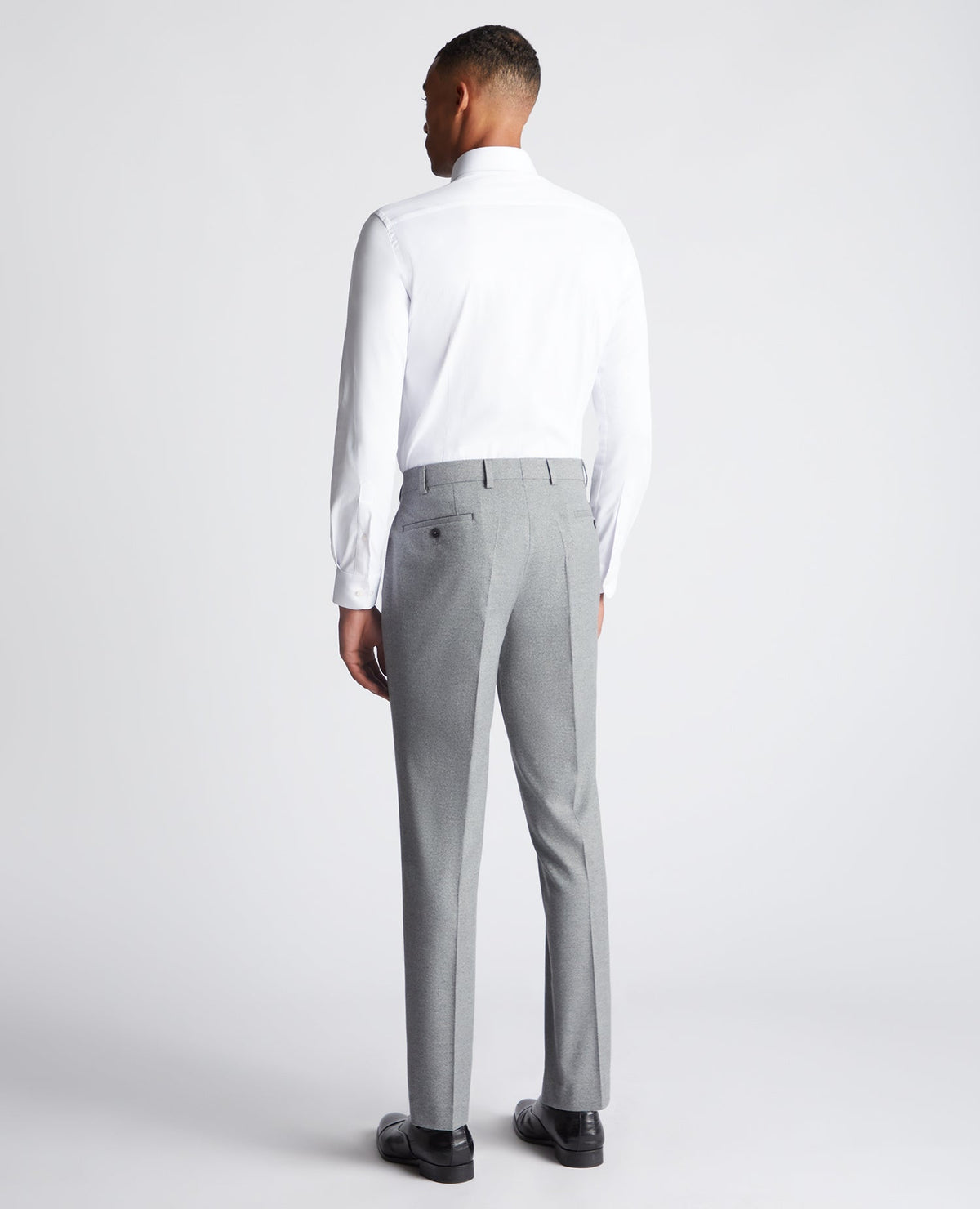 Man wearing a grey Slim Leg Stretch Formal Trousers