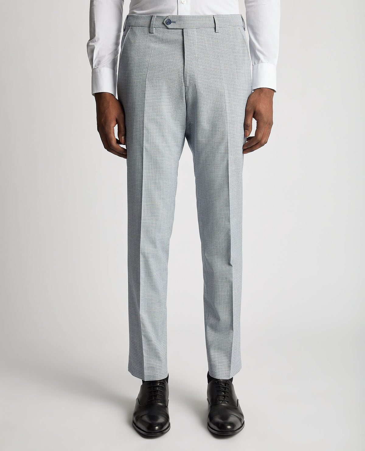 Man wearing a blue Slim Leg Stretch Formal Trousers