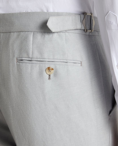 Man wearing a blue Slim Leg Linen-Blend Formal Trousers