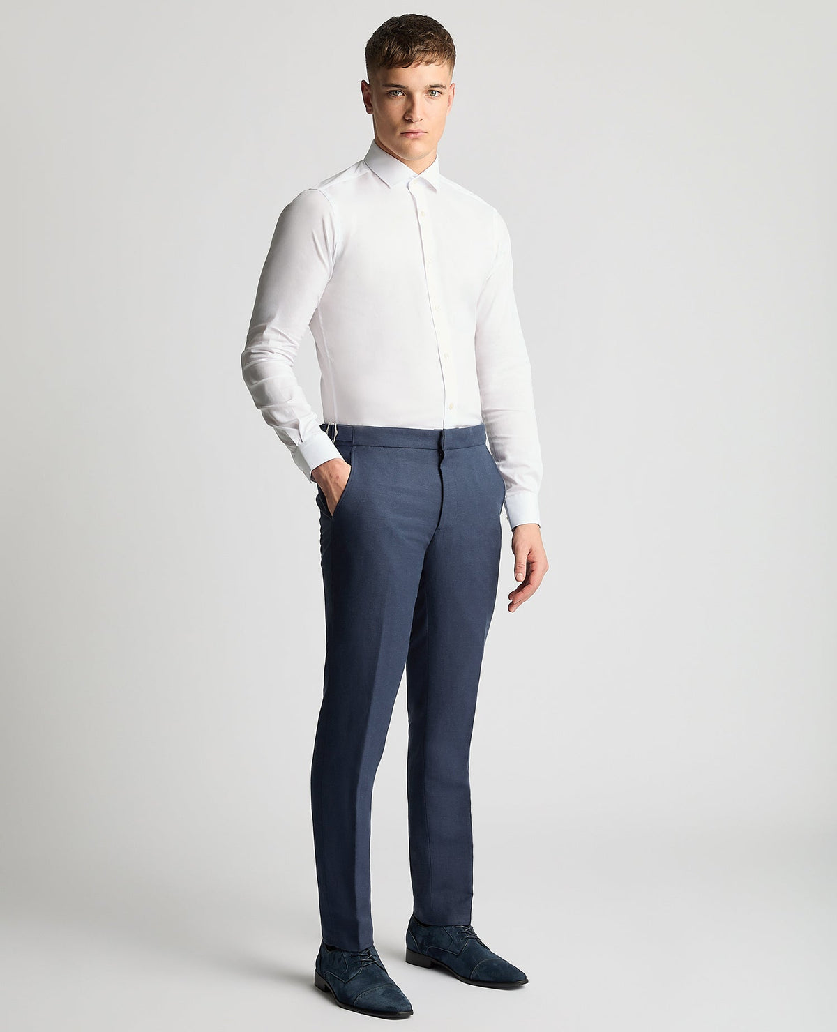 Man wearing a blue Slim Leg Linen-Blend Formal Trousers
