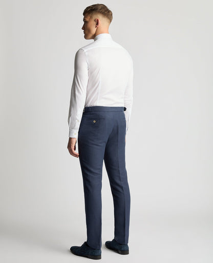 Man wearing a blue Slim Leg Linen-Blend Formal Trousers