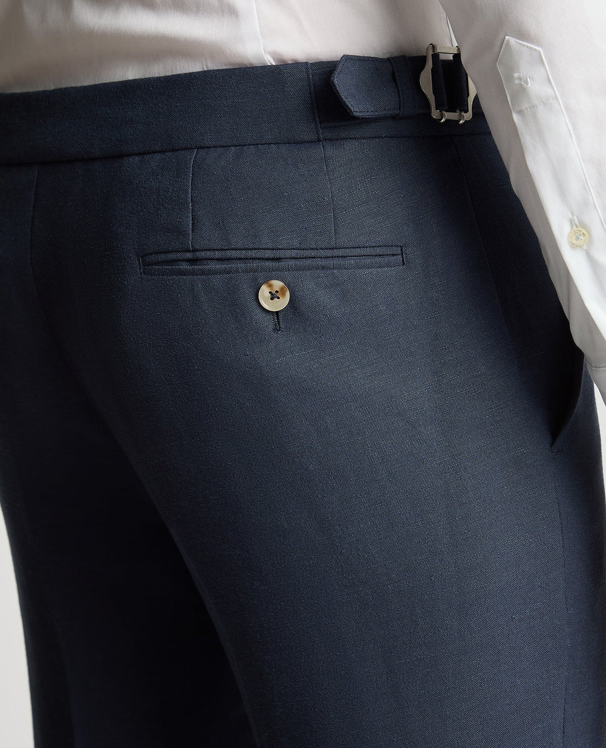 Man wearing a blue Slim Leg Linen-Blend Formal Trousers