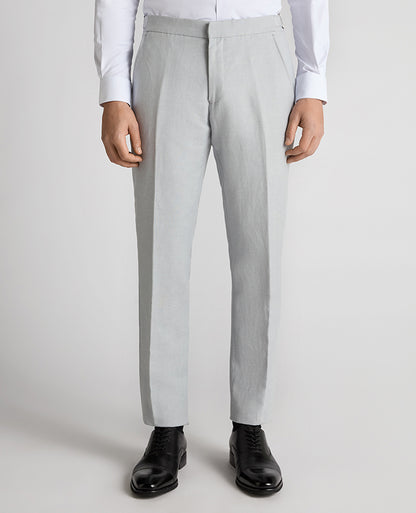 Man wearing a blue Tapered Fit Linen-Blend Formal Trousers