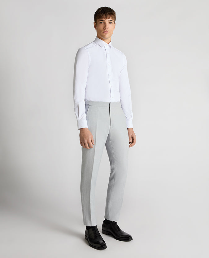 Man wearing a blue Tapered Fit Linen-Blend Formal Trousers