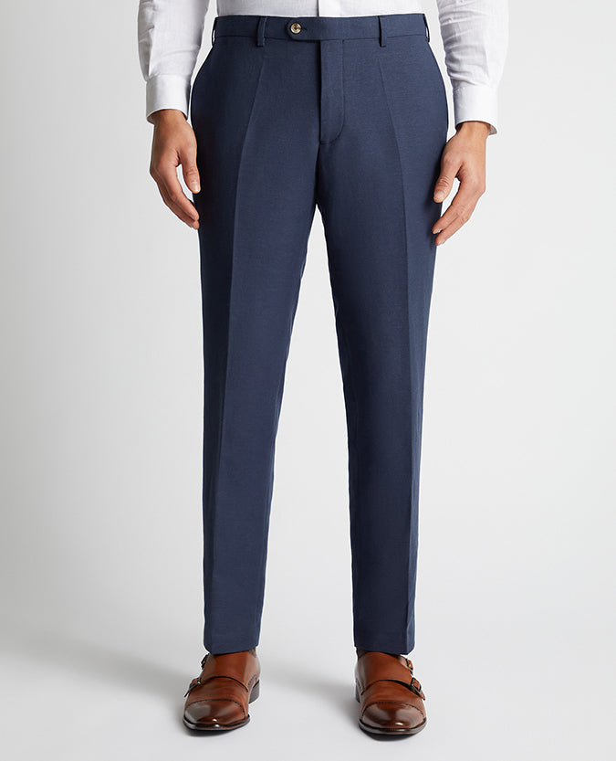 Man wearing a blue Tapered Fit Linen-Blend Formal Trousers