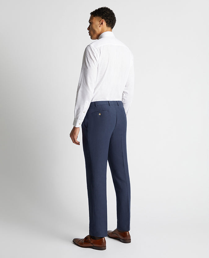 Man wearing a blue Tapered Fit Linen-Blend Formal Trousers