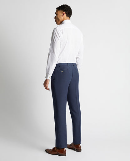 Man wearing a blue Tapered Fit Linen-Blend Formal Trousers