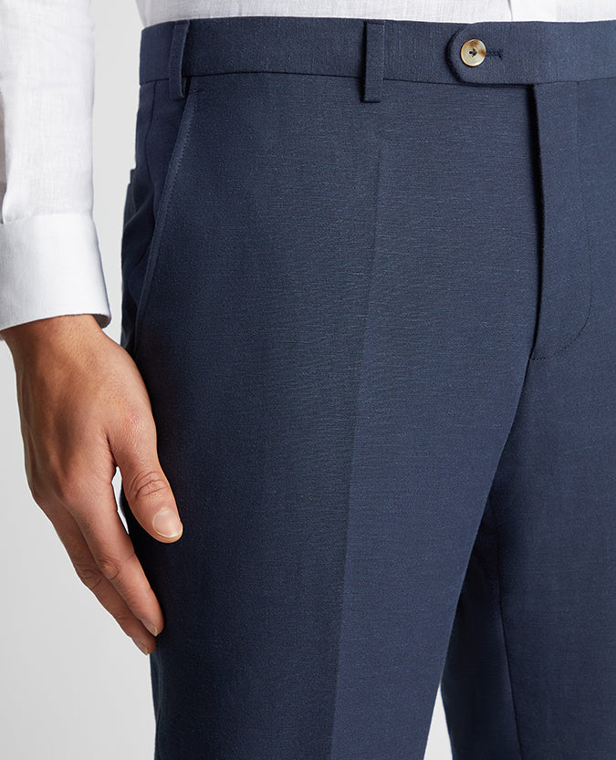Man wearing a blue Tapered Fit Linen-Blend Formal Trousers