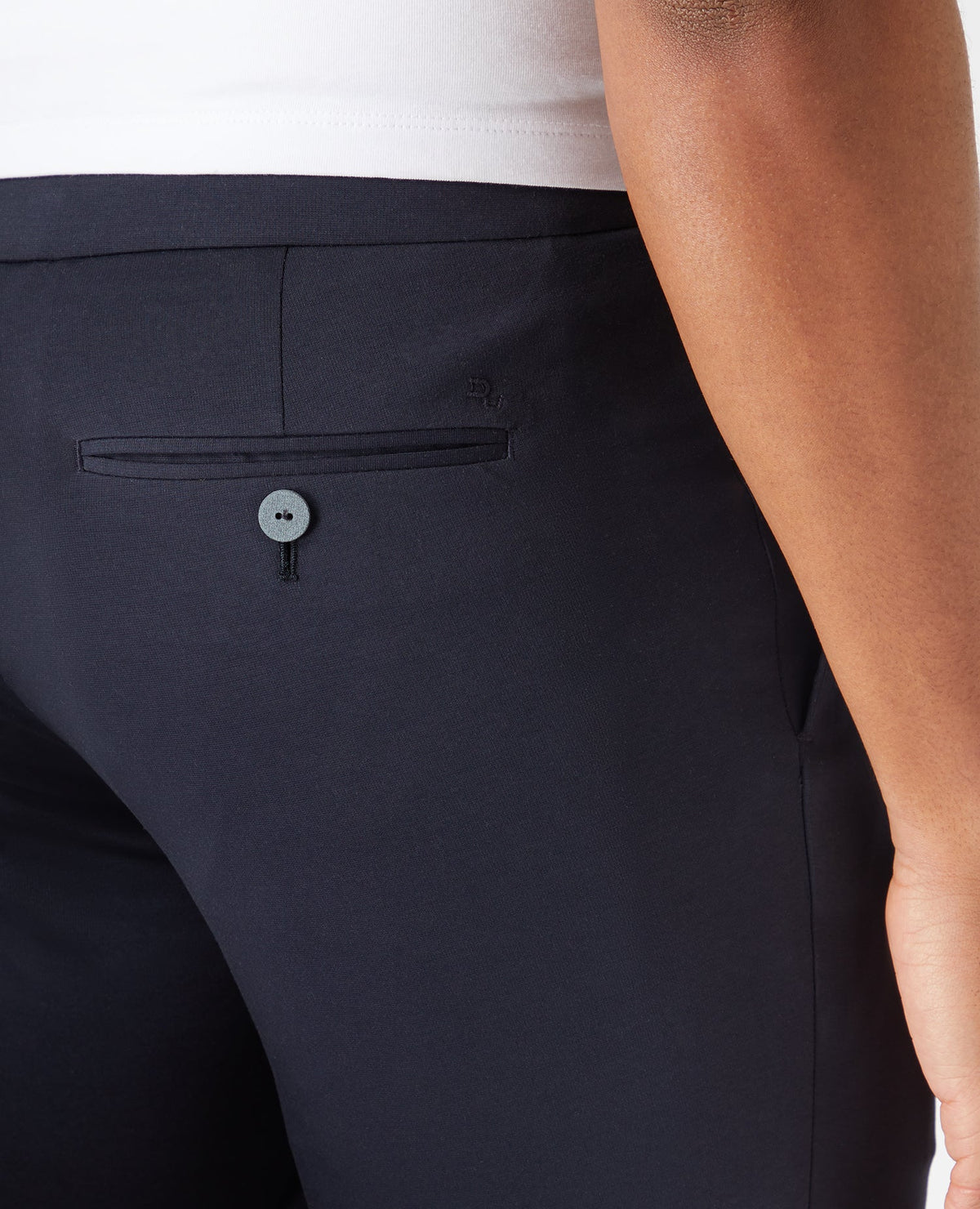 Man wearing a navy Slim Fit Cotton-Stretch Shorts