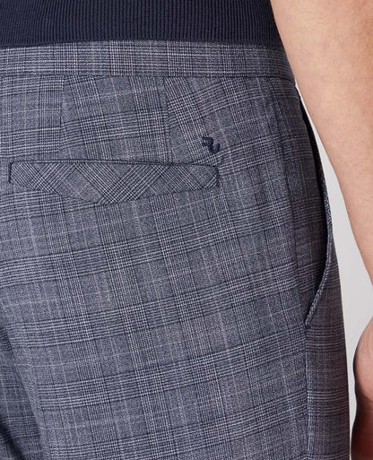 Man wearing a blue X-Slim Leg Checked Stretch Trouser