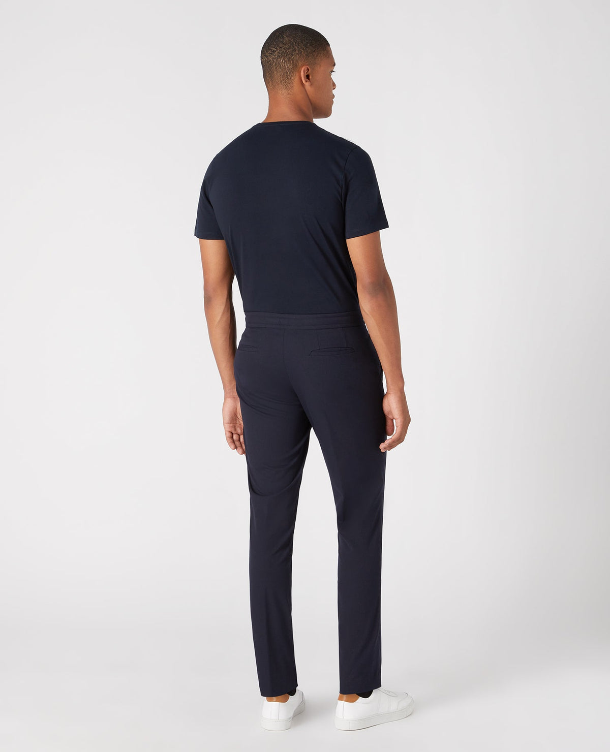 Man wearing a navy Slim Leg Stretch Trouser