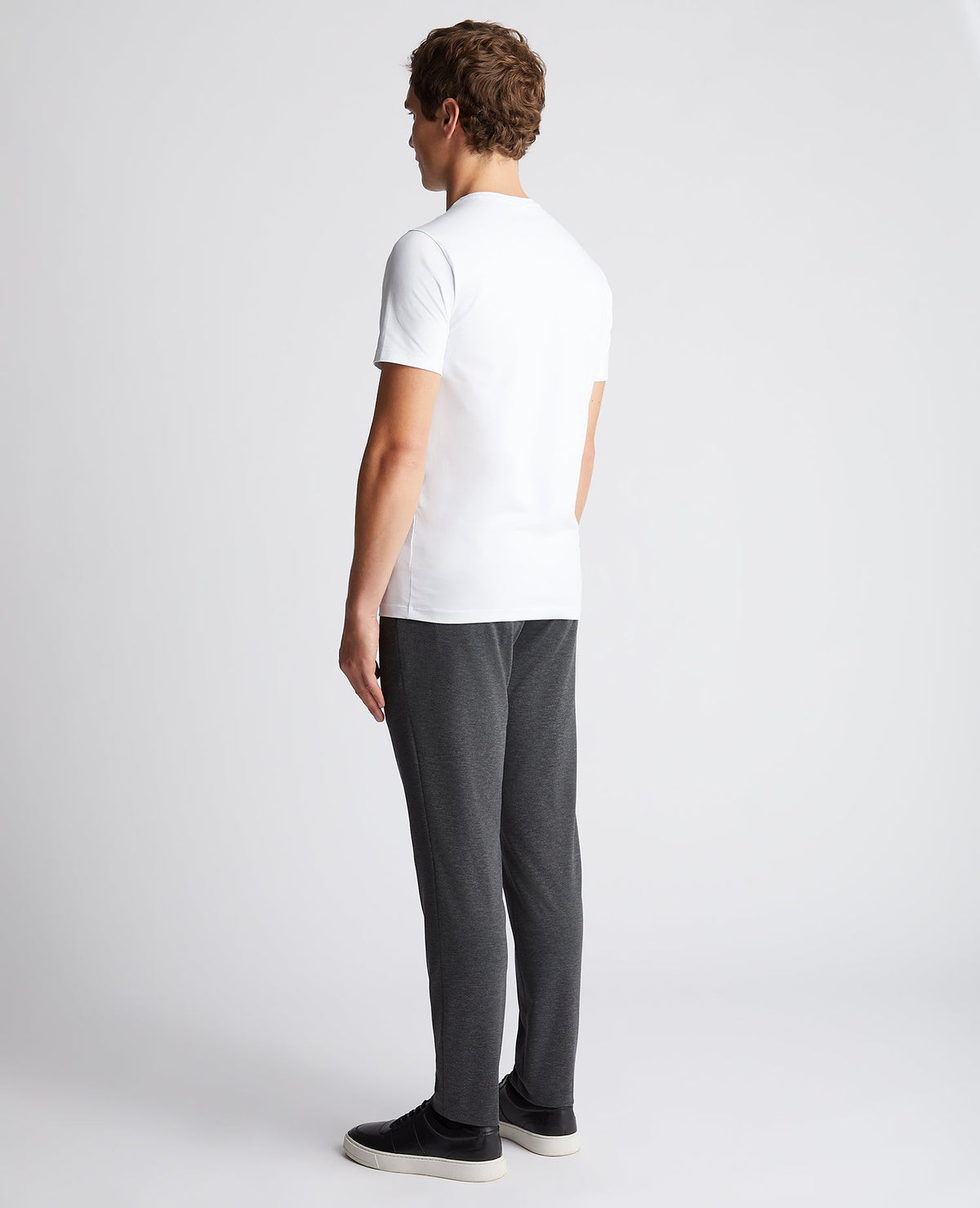 Man wearing a grey Slim Leg Stretch Formal Trousers
