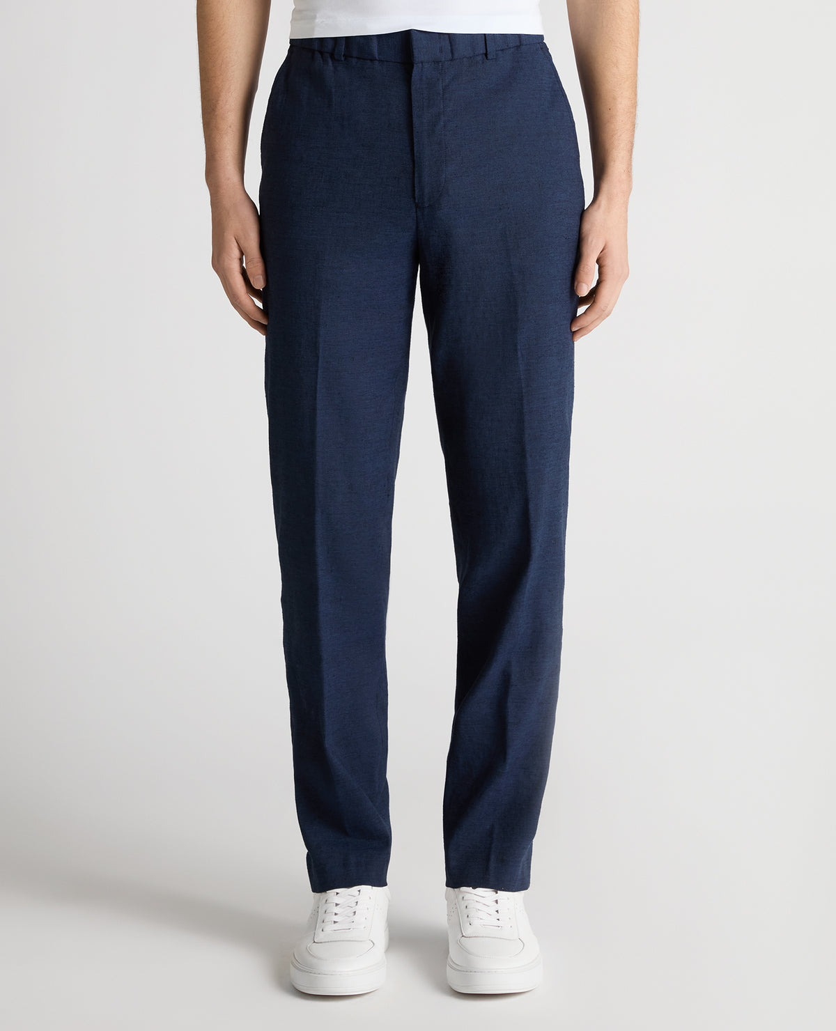 Man wearing a blue Slim Leg Linen-Blend Trousers
