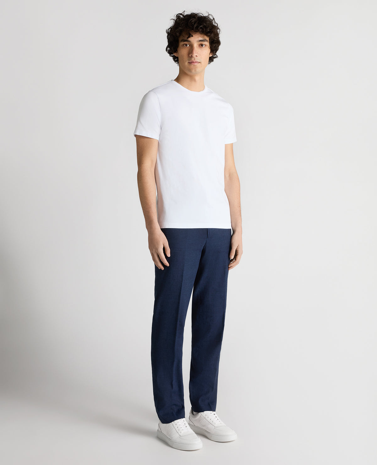 Man wearing a blue Slim Leg Linen-Blend Trousers