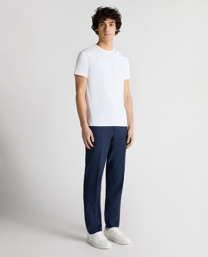Man wearing a blue Slim Leg Linen-Blend Trousers