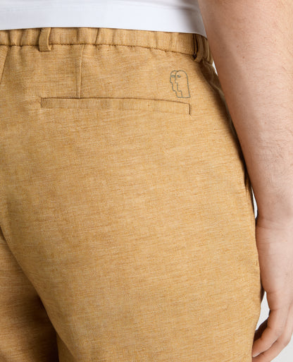 Man wearing a orange Slim Leg Linen-Blend Trousers