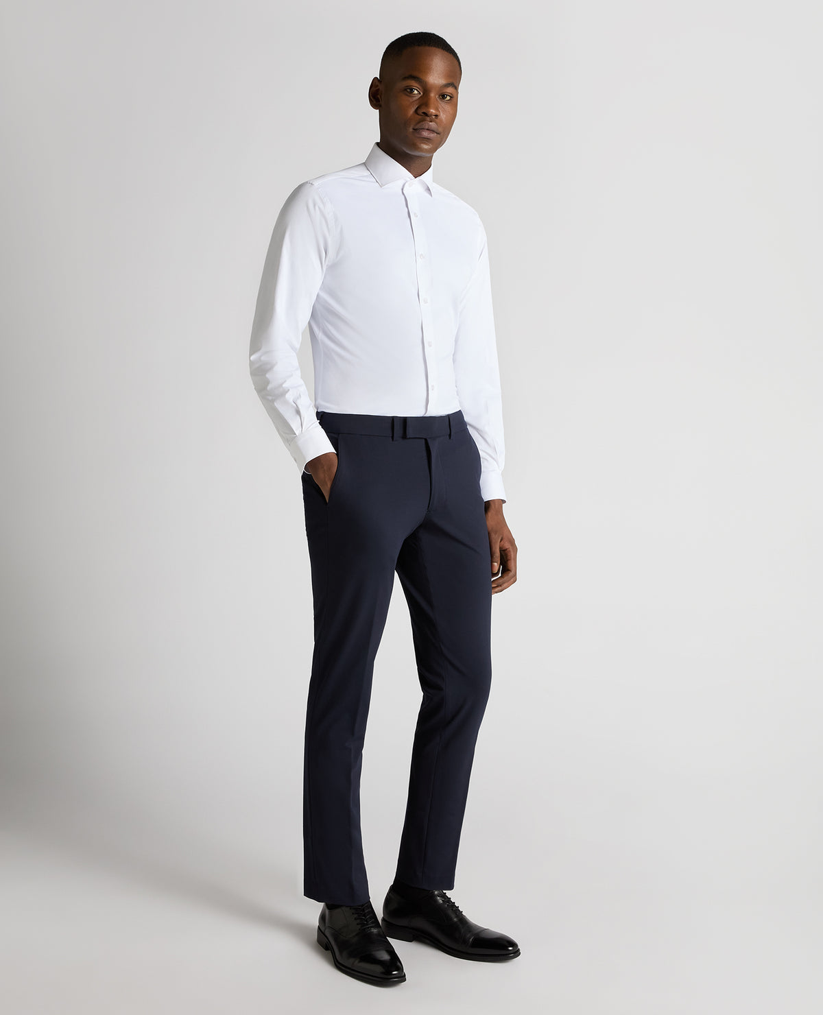 Man wearing a navy Slim Leg Stretch Trousers