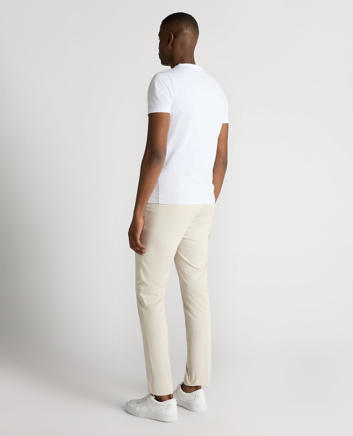 Man wearing a sand Slim Leg Stretch Trousers