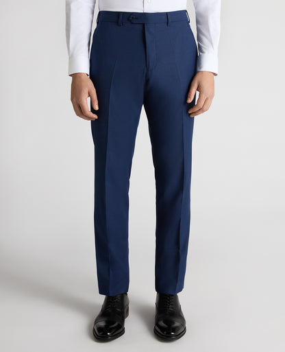 Man wearing a blue Slim Leg Checked Stretch Formal Trousers