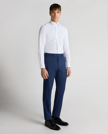 Man wearing a blue Slim Leg Checked Stretch Formal Trousers