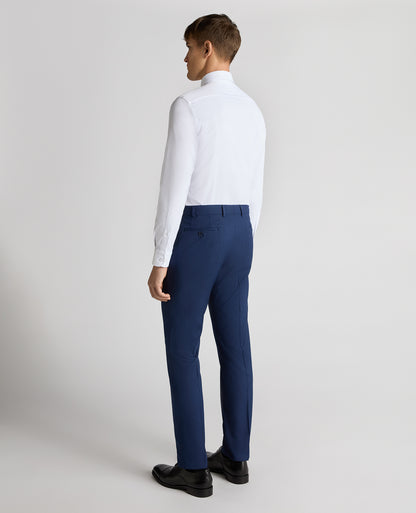 Man wearing a blue Slim Leg Checked Stretch Formal Trousers