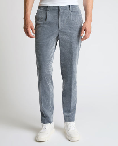 Man wearing a blue Slim Leg Stripe Cotton-Stretch Trousers