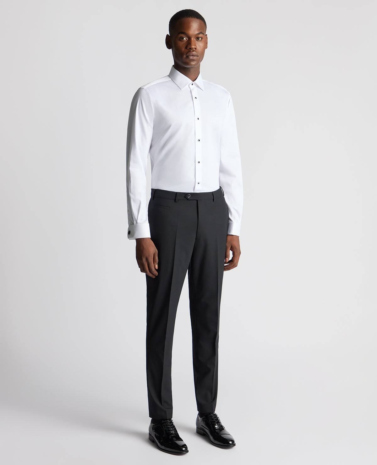 Man wearing a black Slim Fit Wool-Blend Formal Trousers