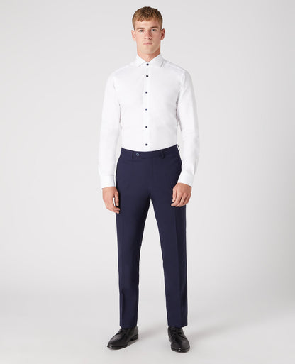 Man wearing a navy Tapered Leg Wool-Blend Suit Trouser