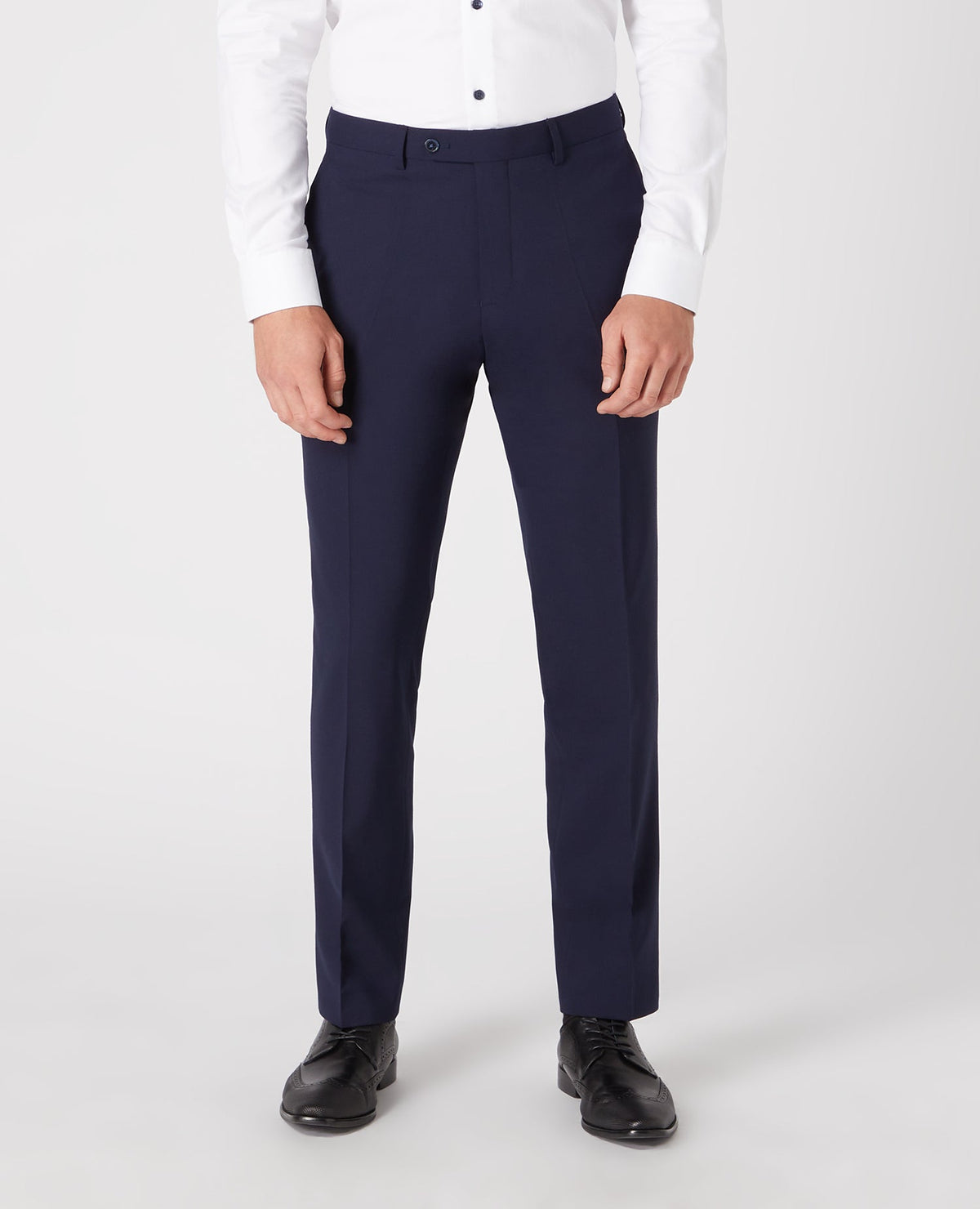 Man wearing a navy Tapered Leg Wool-Blend Suit Trouser