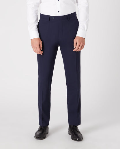 Man wearing a navy Tapered Leg Wool-Blend Suit Trouser