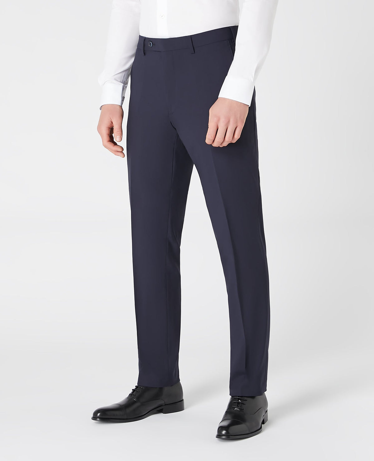 Man wearing a navy Tapered Leg Wool-Blend Suit Trouser
