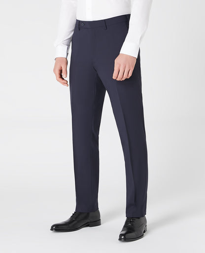 Man wearing a navy Tapered Leg Wool-Blend Suit Trouser
