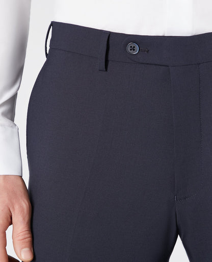 Man wearing a navy Tapered Leg Wool-Blend Suit Trouser