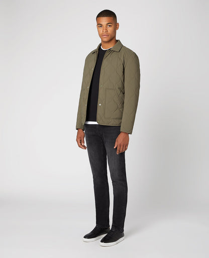 Man wearing a green Lightweight Quilted Overshirt