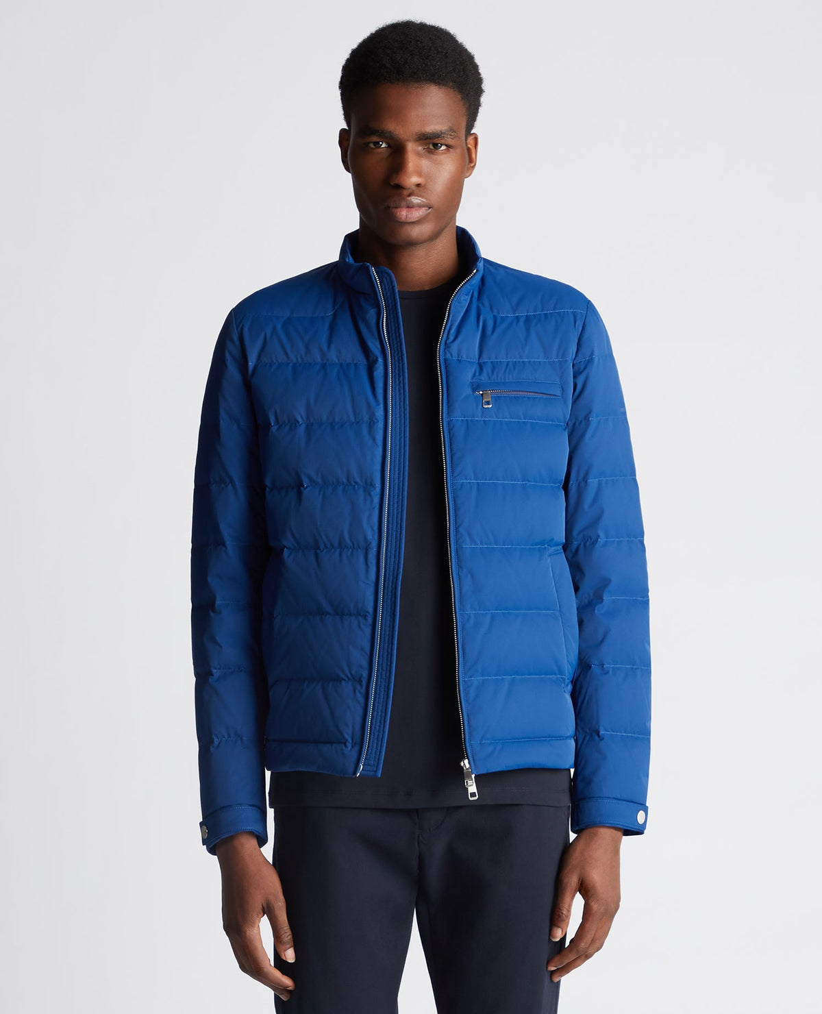 Man wearing a blue Regular Fit Quilted Jacket