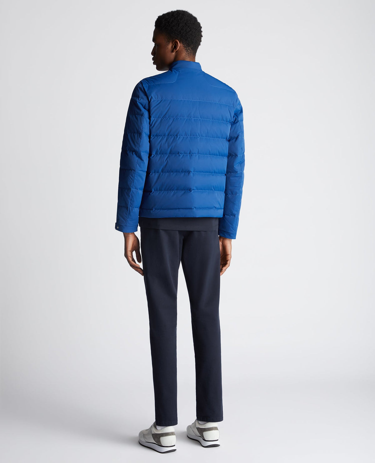 Man wearing a blue Regular Fit Quilted Jacket