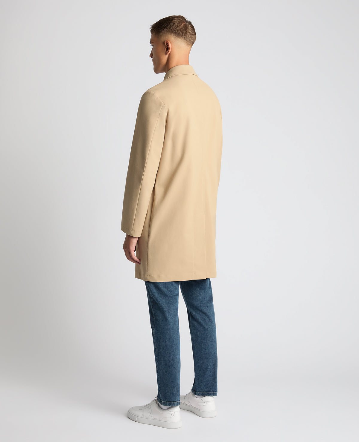 Man wearing a sand Regular Fit Showerproof Mac