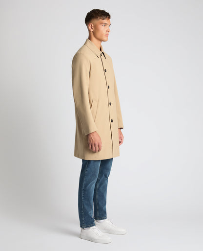 Man wearing a sand Regular Fit Showerproof Mac