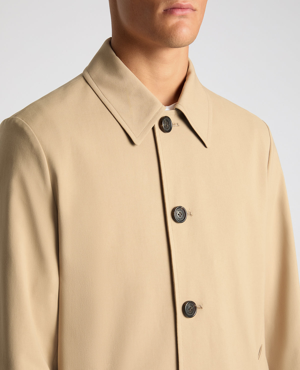 Man wearing a sand Regular Fit Showerproof Mac