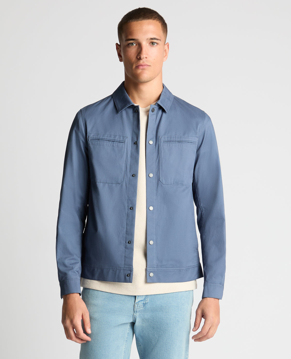Man wearing a blue Regular Fit Cotton Twill Utility Jacket
