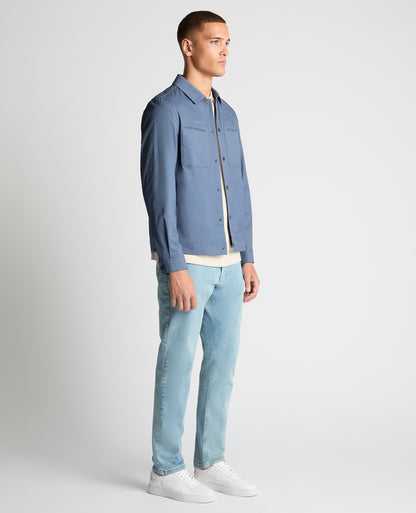 Man wearing a blue Regular Fit Cotton Twill Utility Jacket