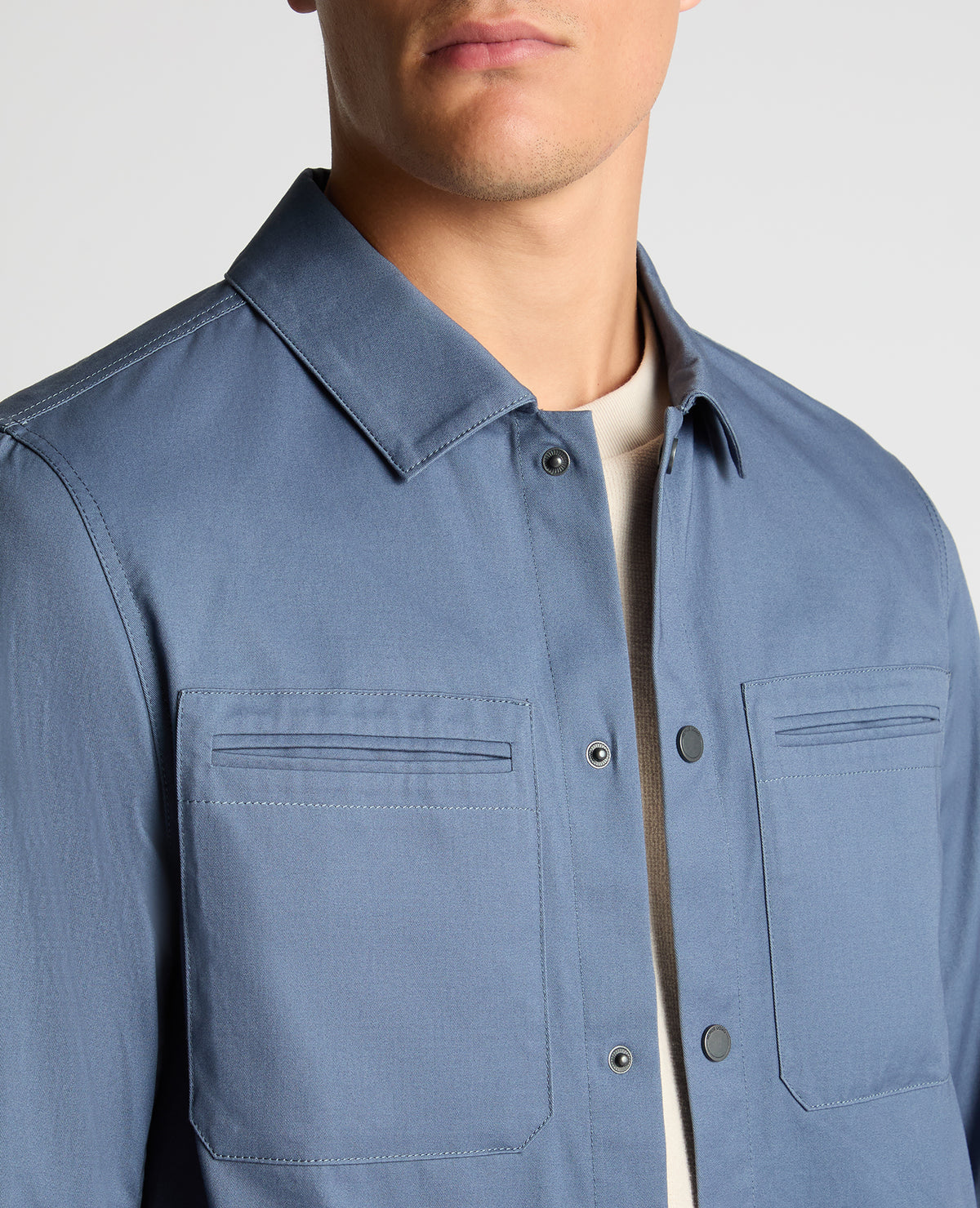 Man wearing a blue Regular Fit Cotton Twill Utility Jacket