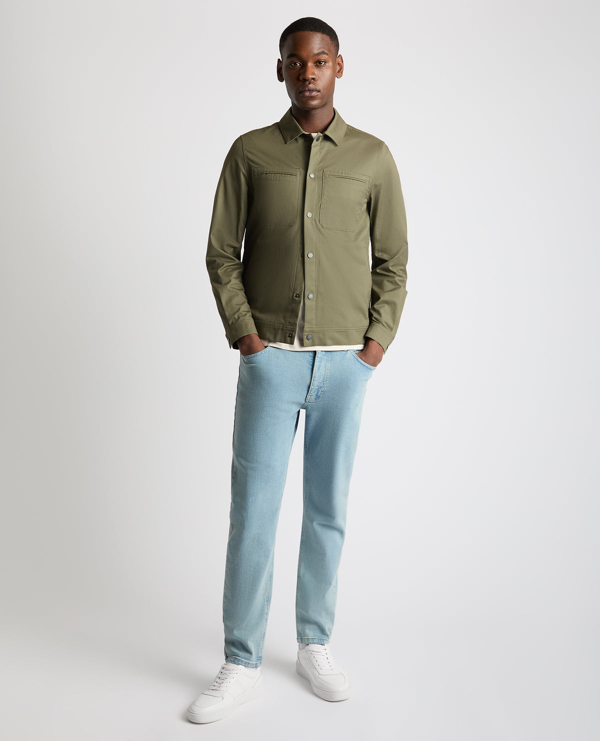 Man wearing a green Regular Fit Cotton Twill Utility Jacket