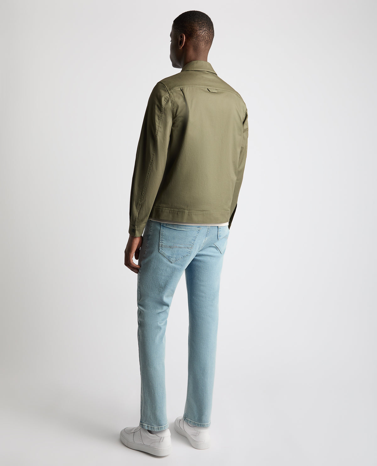 Man wearing a green Regular Fit Cotton Twill Utility Jacket