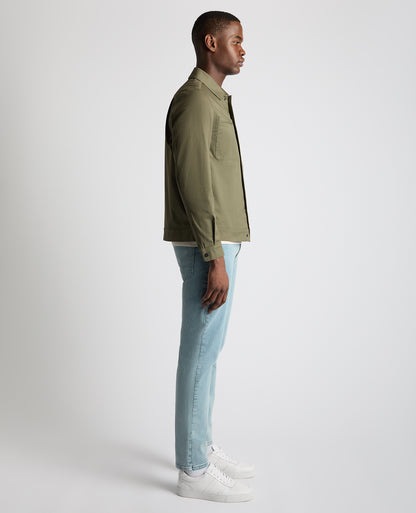 Man wearing a green Regular Fit Cotton Twill Utility Jacket